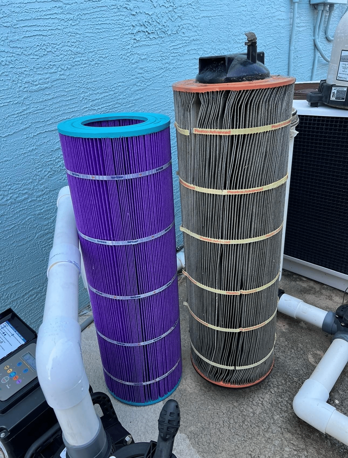 A new and old pool filter cartridge side by side, with the old one visibly dirty and worn.