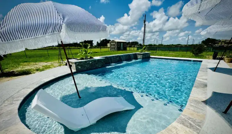 Free form Pool WIth chairand umbrella